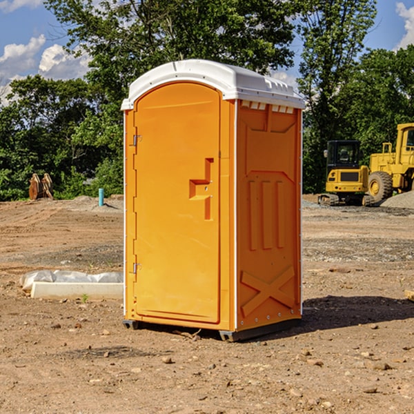 are there any restrictions on what items can be disposed of in the portable toilets in Four Bears Village